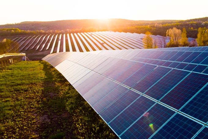 Stock image of solar panels representing Lacima's work in renewable solar power offering two solutions through Lacima Trader and Lacima Analytics providing a complete solution from structuring and trading to risk management of renewable energy portfolios.