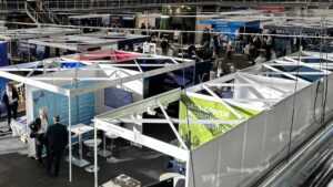 Energy Trading Week Europe exhibition floor with Lacima’s analytics and risk management stand at the centre.
