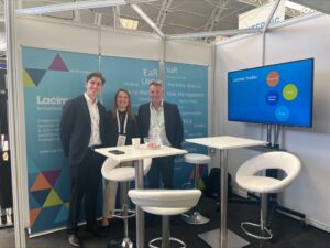 Lacima team with Stephen, Nathaniel, and Marianne Hocking from European Energy Exchange at the Lacima stand, Energy Trading Week Europe 2025.